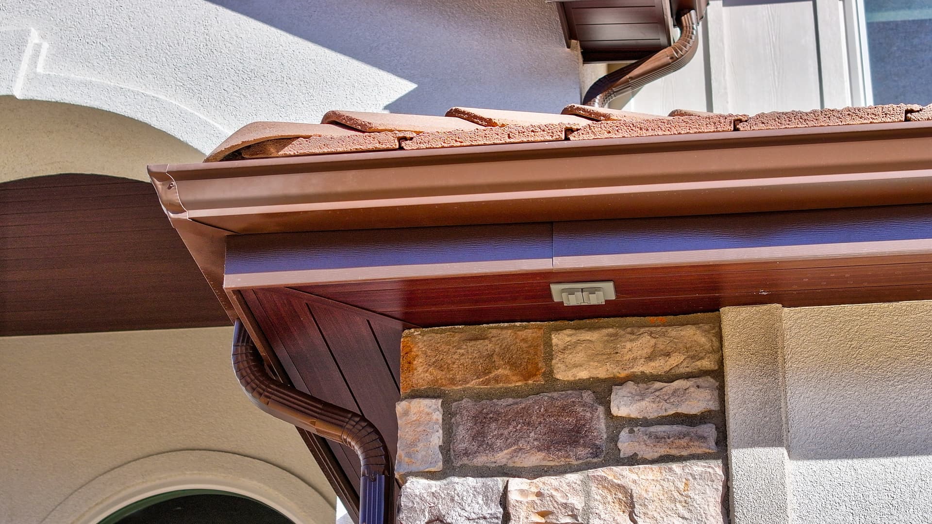 Aluminum siding with copper gutters and soffit detail on a Morrison Colorado home