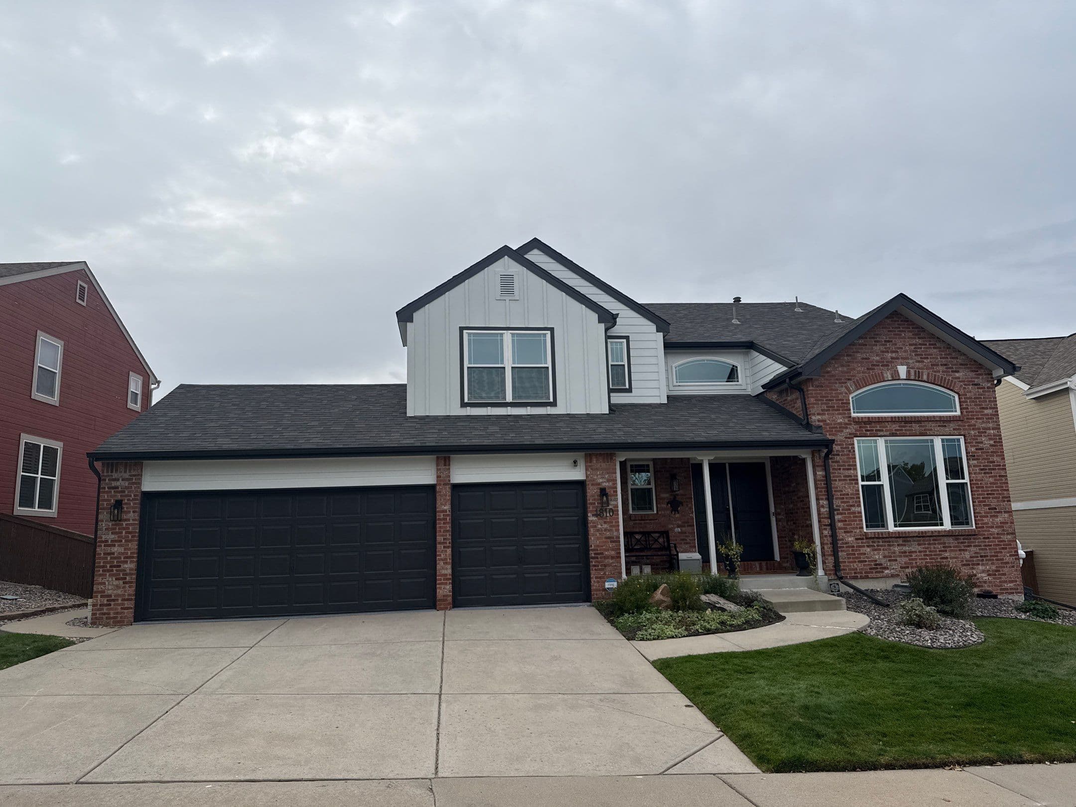 James Hardie lap and board and batten siding replacement with new trim on Highlands Ranch Colorado home