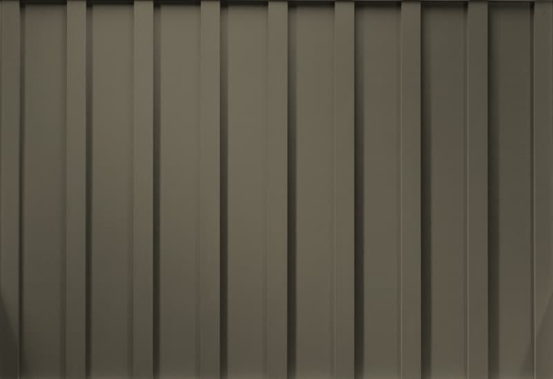 HardiePanel board and batten siding in Timber Bark texture closeup