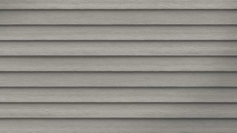 HardiePlank lap siding in Cedarmill Pearl Gray texture closeup