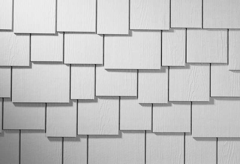 HardieShingle staggered edge siding in Arctic White texture closeup