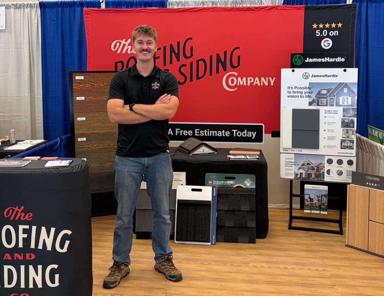 The Roofing and Siding Company team at Denver home show with James Hardie and GAF certified materials