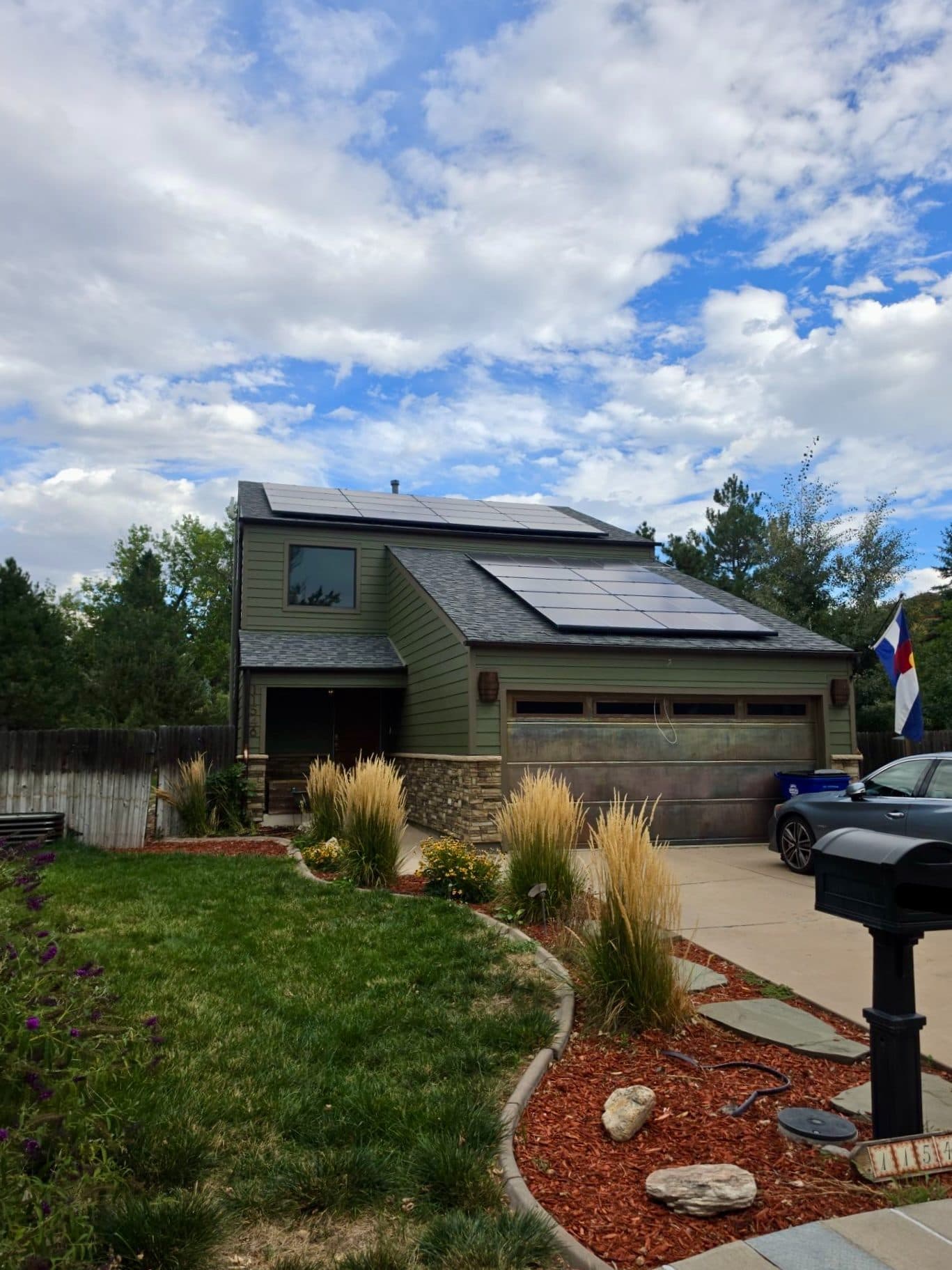 After photo of home in Aurora, CO with new James Hardie lap siding in Mountain Sage and Versetta Stone veneer accents.