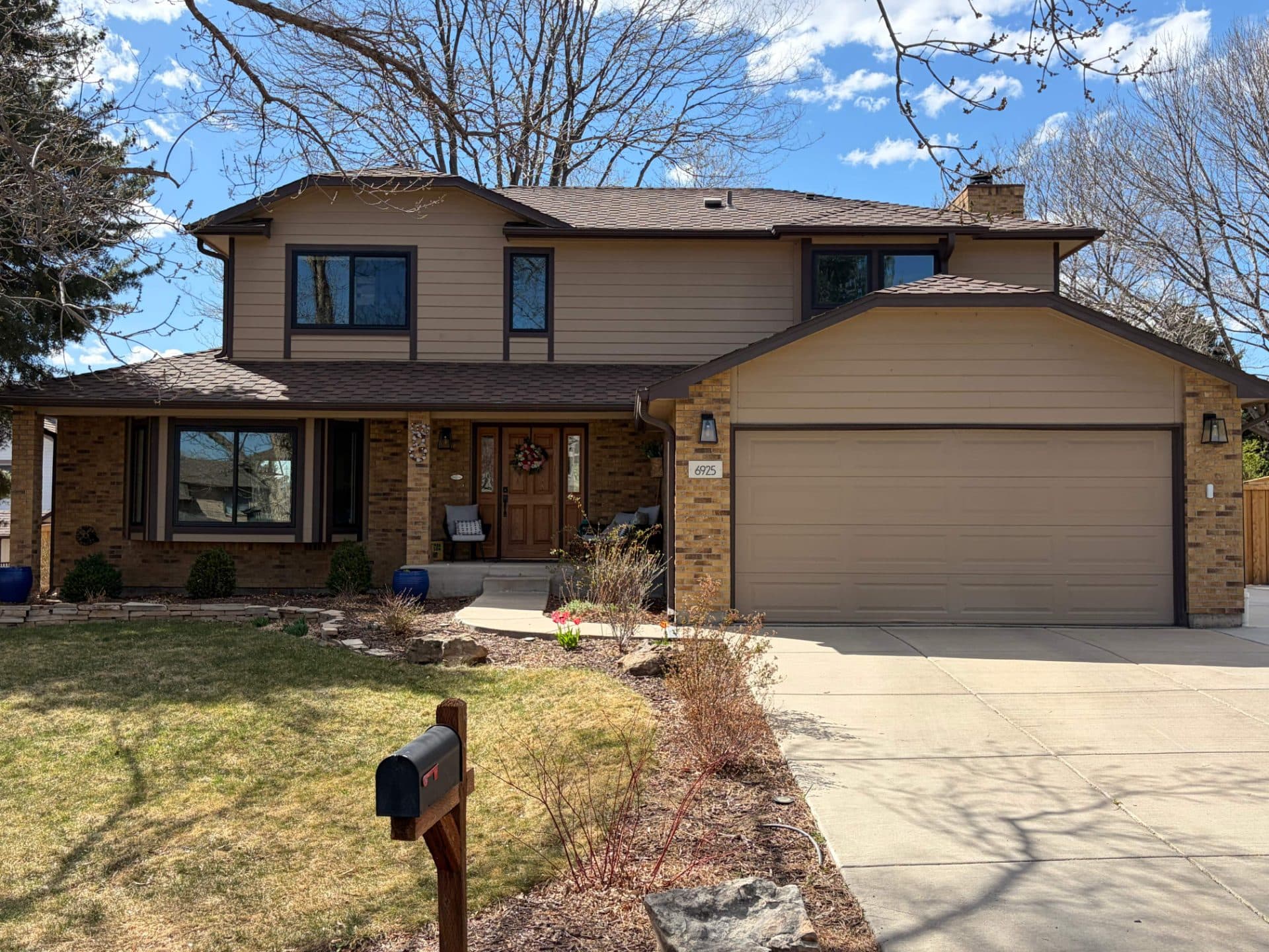 Before new siding on a home in Arvada, CO.