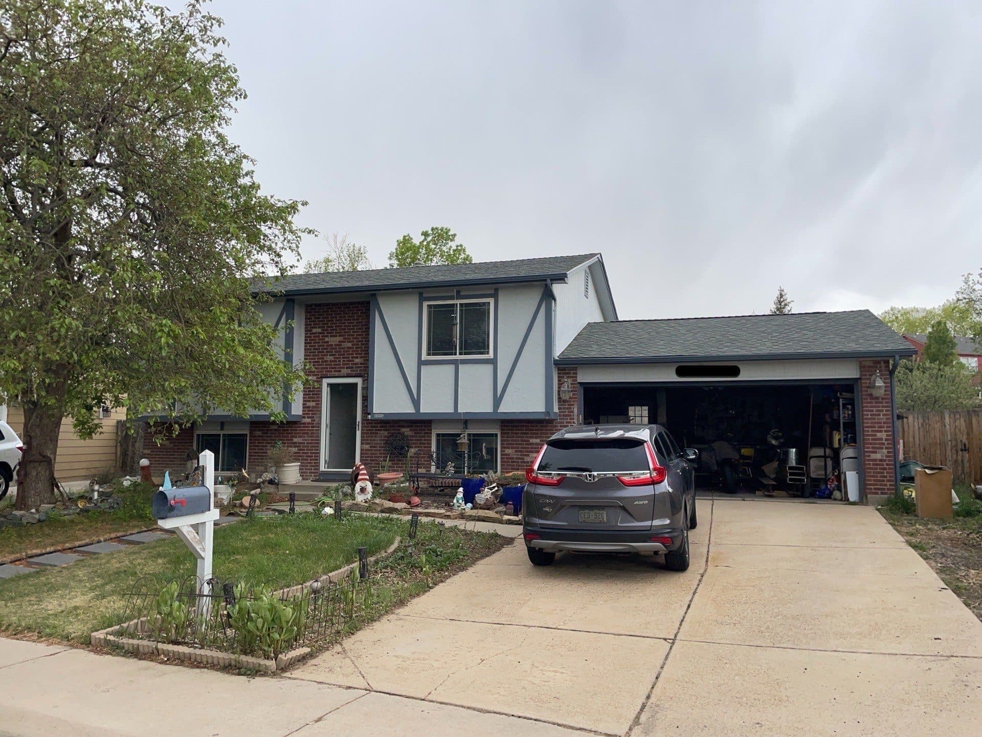 Before picture of a home in Westminster, CO, with old siding.