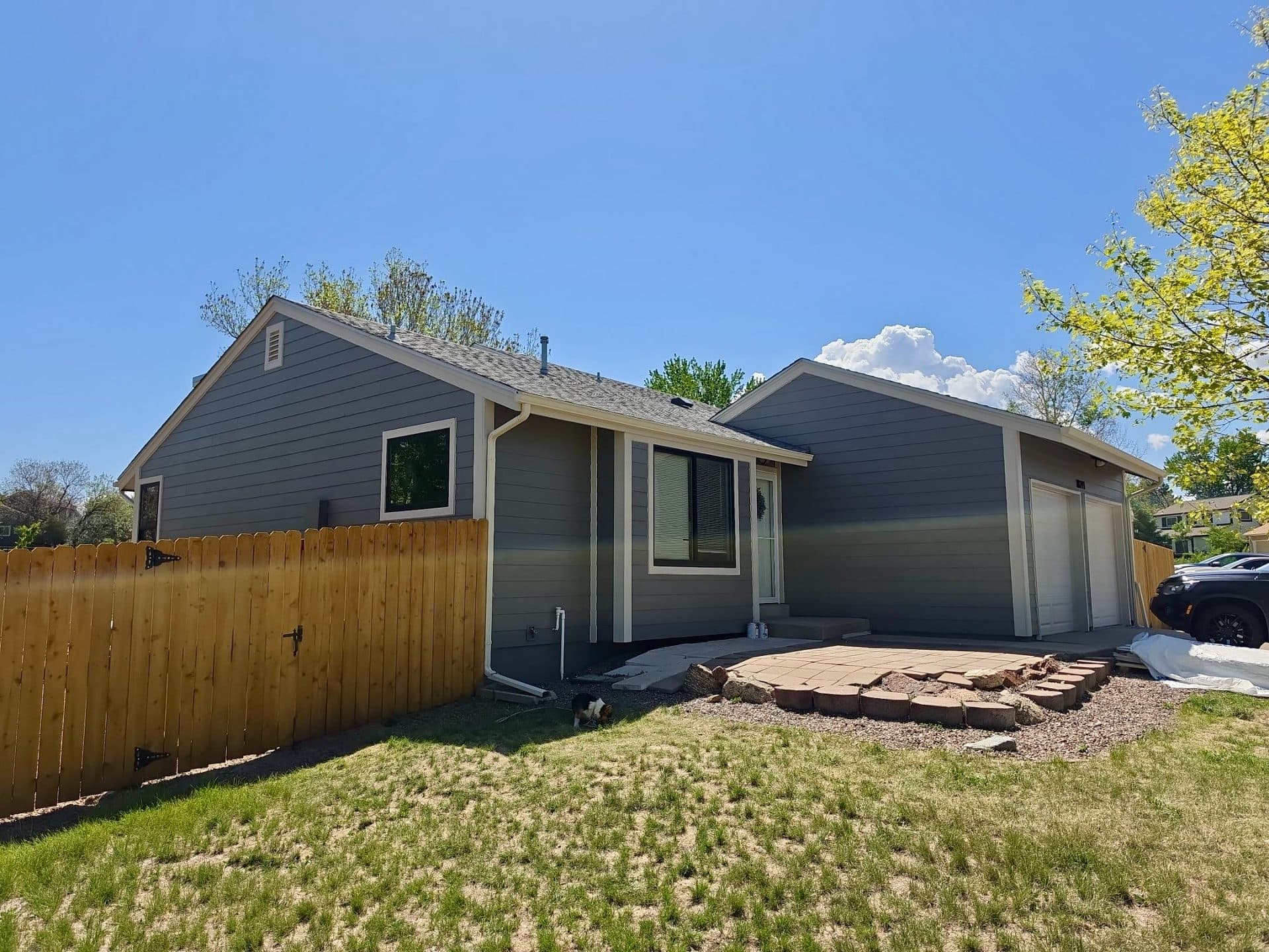 After — Full Exterior Siding Replacement in Centennial, CO. James Hardie in Aged Pewter and Cobblestone