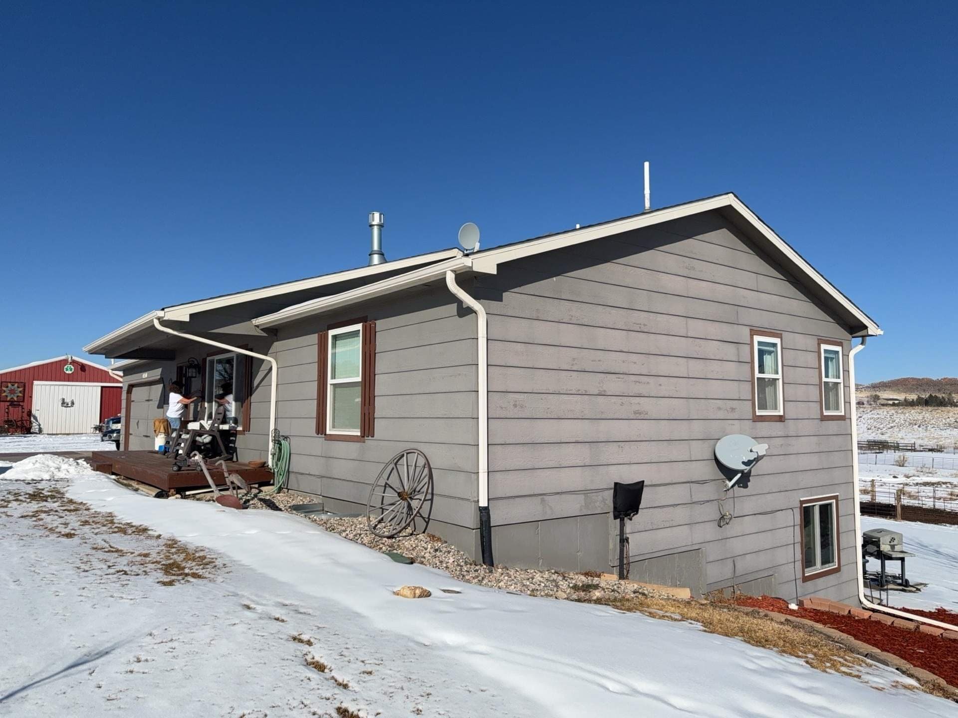 Before — LP SmartSide siding with painted soffits, fascia, trim & doors — Loveland, CO