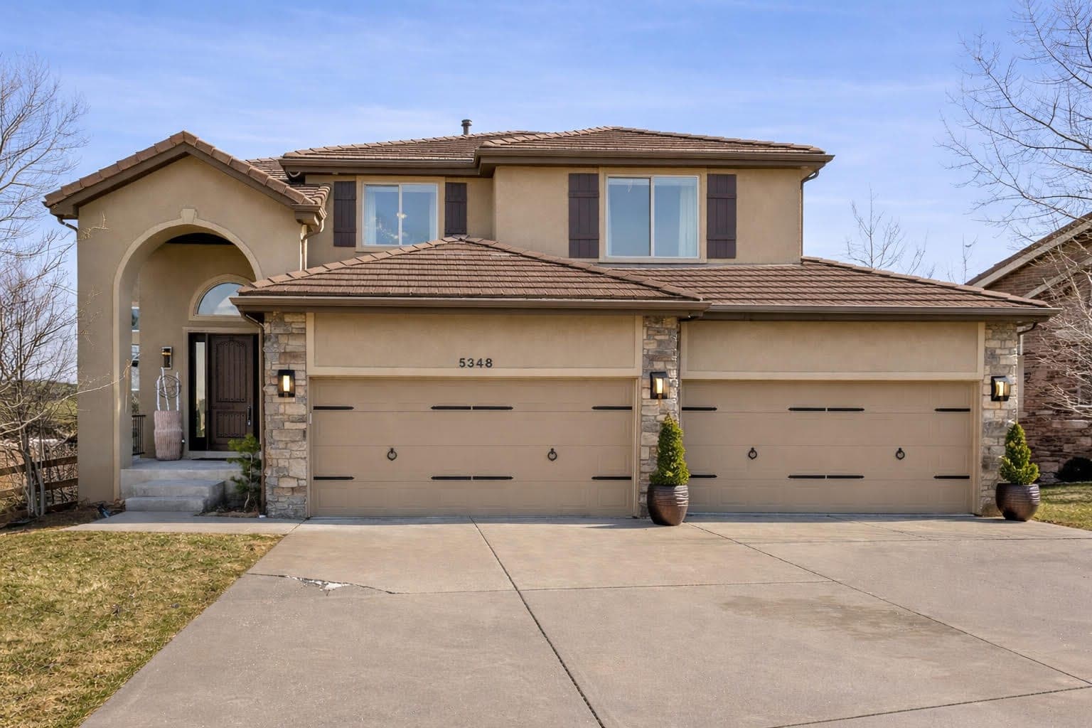 Before — James Hardie board & batten siding, Longboard aluminum soffits & new gutters — Morrison, CO