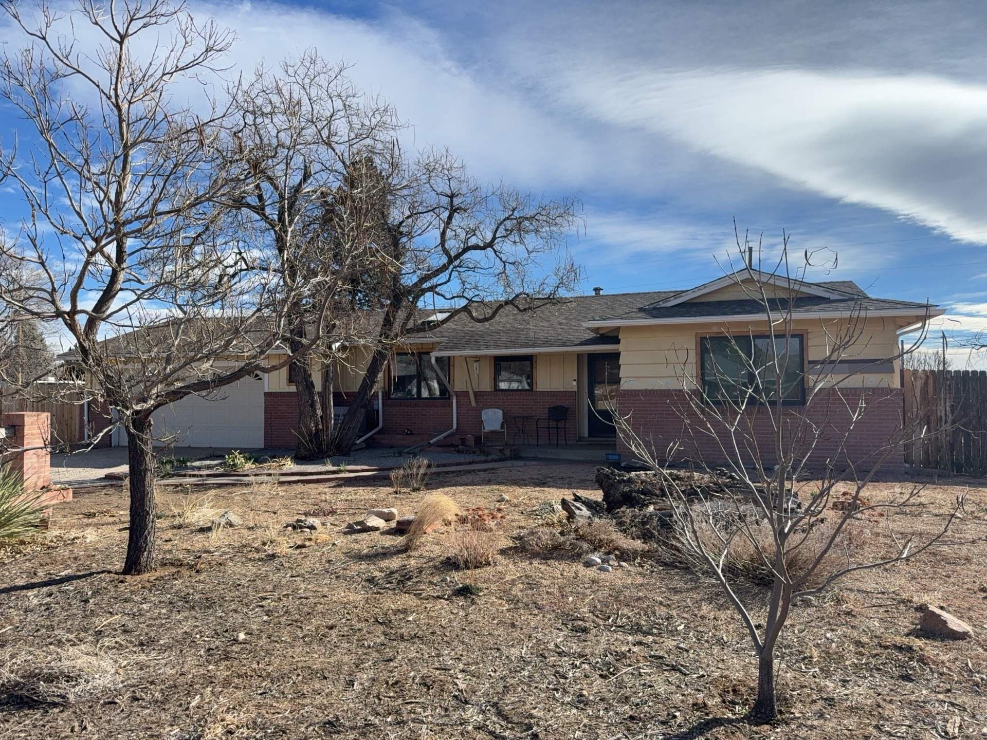 Before — Full Exterior Refresh in Golden, Colorado: James Hardie Board & Batten, Gutters, and Painted Accents