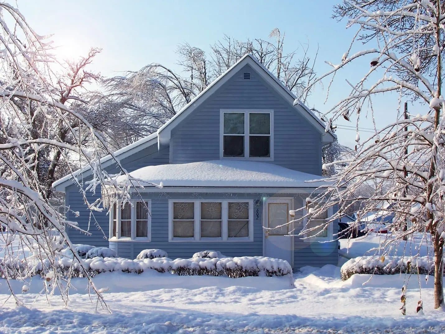 Home with snow on it with James Hardie siding.