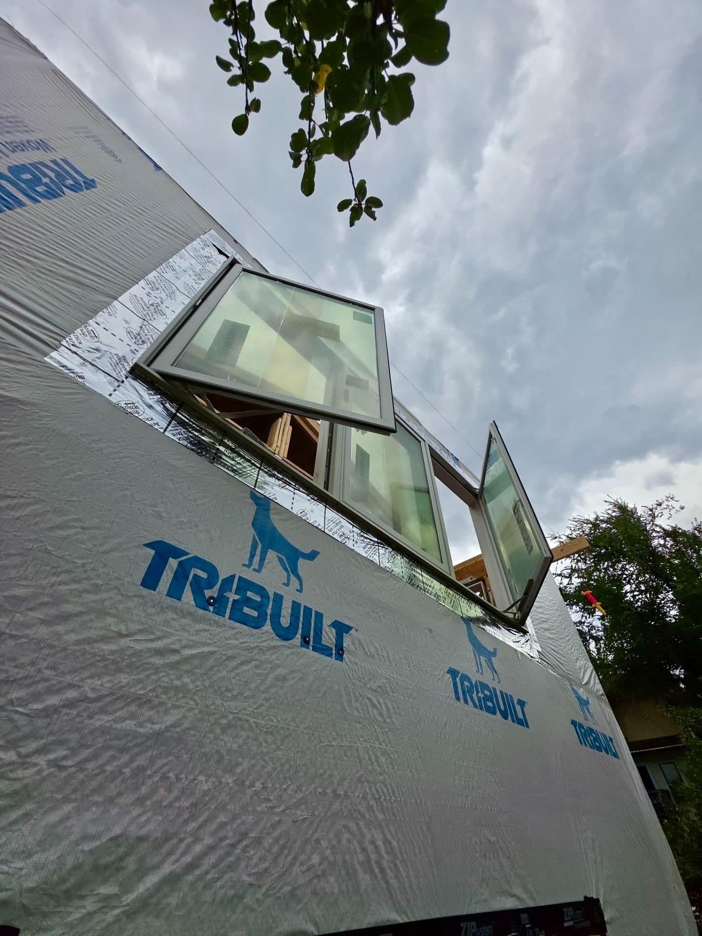 Looking up a a newly installed Marvin window on a home in Boulder, Colorado.