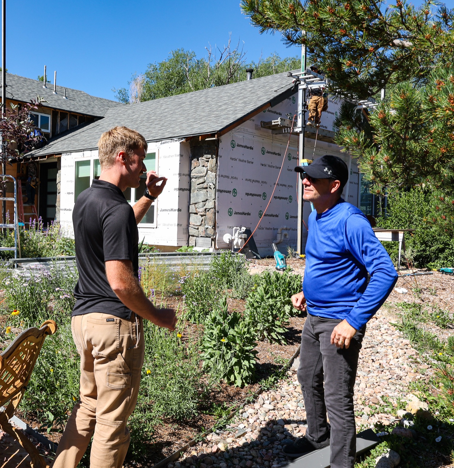 Project manager discussing installation details with Bobby at the Boulder, CO home